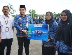 Pemkab Kotabaru Gelar Apel Gabungan dan Serahkan Hadiah Kredit Multiguna Bank Kalsel Untuk ASN